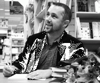 Signing Books at the launch of Henry and the Flea